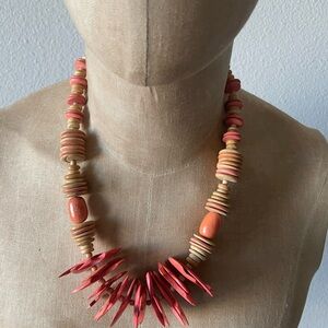Handcrafted Wooden Necklace with Red Accents